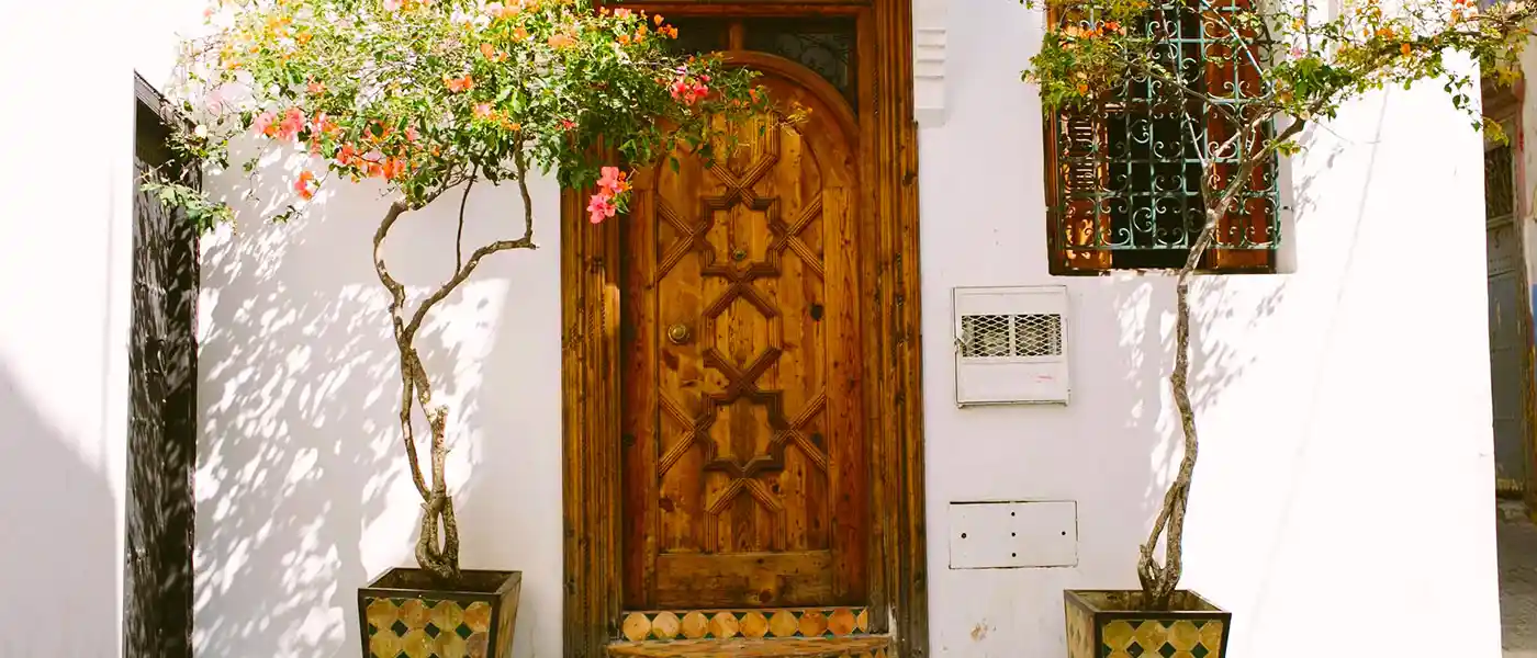 What to do in Morocco - day trip to Tangier - ferry trip to Tangier - Moroccan wooden gate